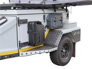 Off-road camping trailer with storage compartments and rugged wheel for pro water tank use