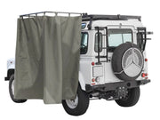 Off-road vehicle with rear spare tire and side curtain for Front Runner Rack Mount Shower Cubicle