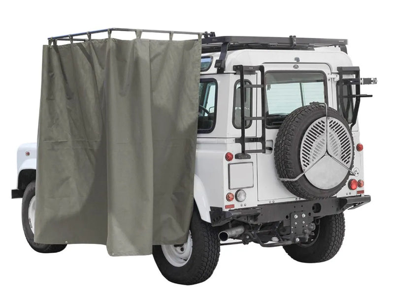 Off-road vehicle with rear spare tire and side curtain for Front Runner Rack Mount Shower Cubicle