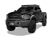Black RAM pickup truck with off-road modifications featuring a Front Runner roof rack kit