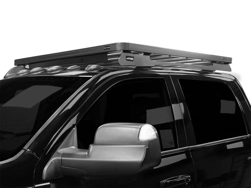 Roof rack kit installed on black SUV for enhanced cargo capacity and utility