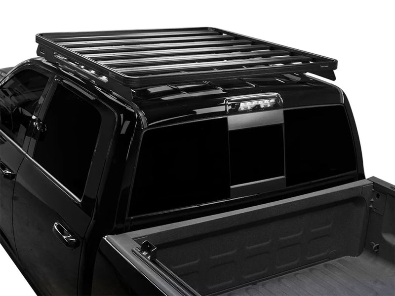 Roof rack kit mounted on a Pickup Truck Cab for enhanced cargo carrying capability