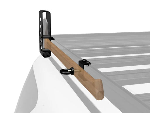 Front Runner Roof Rack Axe Bracket attached to Slimline II Roof Rack for vehicle cargo