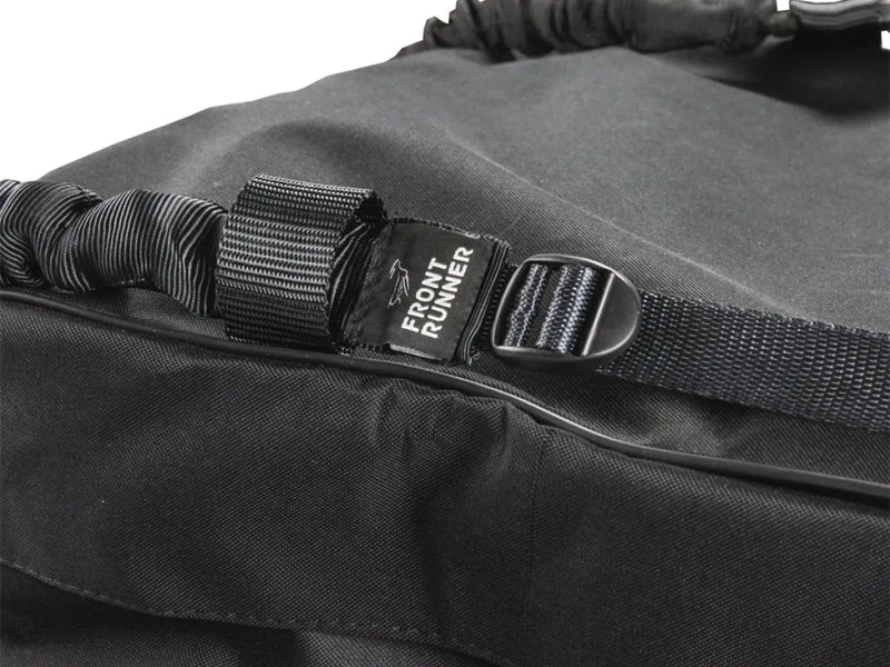 Black camera storage bag with strap and buckle for large roof transit storage bag
