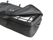 Black transit storage bag with open zipper showing organized interior for large roof storage