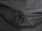 Zipper on a dark fabric transit storage bag for large roof cargo applications