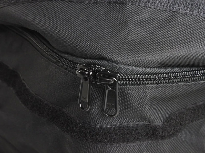 Zipper on a dark fabric transit storage bag for large roof cargo applications