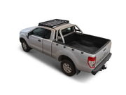 Silver pickup truck with open cargo bed and roof rack kit on 4th Gen Ford Ranger