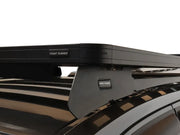 Roof rack mounted on a vehicle featuring the Front Runner Slimline II Tray Roof Rack Kit for Nissan Navara D23
