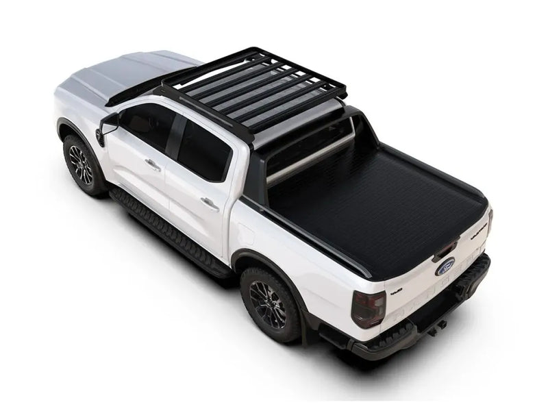 White pickup truck with slimline ii roof rack tray and black roof rack cover