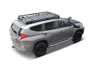 Gray SUV with Front Runner Slimline II Roof Rack Kit and black wheels
