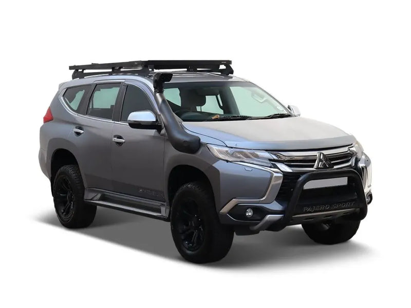 Rugged gray Mitsubishi Pajero Sport with off-road modifications and Front Runner Slimline II roof rack kit