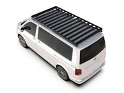 White van with a black roof rack featuring the Front Runner Slimline II tray for Volkswagen T6