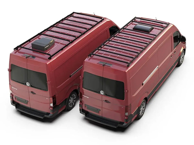 Two red Volkswagen Crafter vans with roof racks viewed from above, showcasing the rack kit