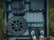 Off-road vehicle with open roof and spare tire showcasing van rack kit for Volkswagen Crafter