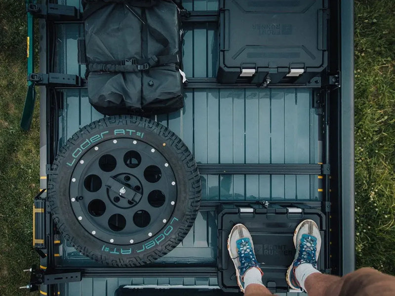 Off-road vehicle with open roof and spare tire showcasing van rack kit for Volkswagen Crafter