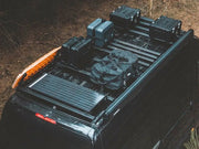 Roof rack on Volkswagen Crafter van loaded with gear, part of Front Runner Slimpro rack kit