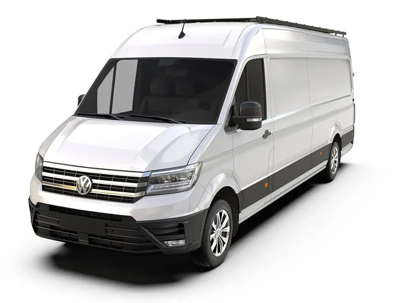 White Volkswagen cargo van with high roof featuring front runner slimpro van rack kit