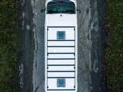 White Volkswagen Crafter van with roof rack kit viewed from above showcasing the van rack