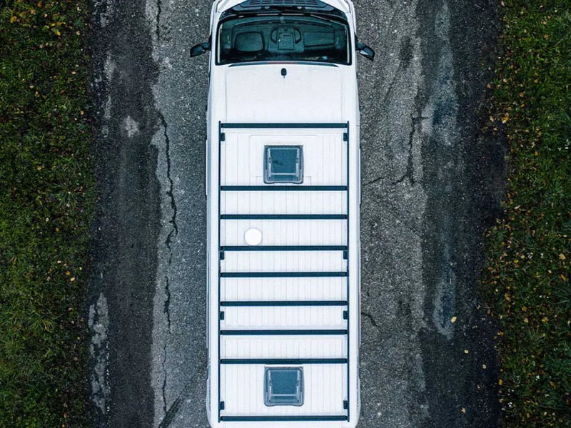 White Volkswagen Crafter van with roof rack kit viewed from above showcasing the van rack