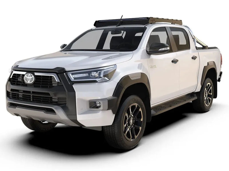 Toyota Hilux pickup with off-road styling and Front Runner Slimsport Roof Rack Kit