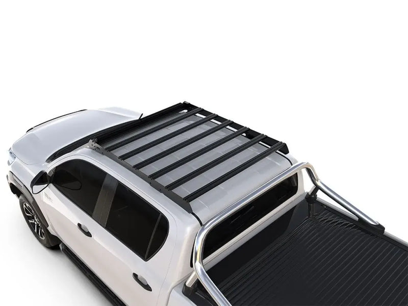Pickup truck with Front Runner Slimsport roof rack kit over cargo bed for Toyota Hilux
