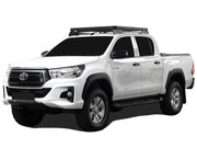White Toyota Hilux Revo DC with Front Runner Slimline II roof rack kit
