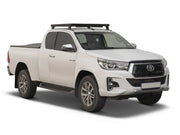 White Toyota Hilux Revo Extra Cab with Slimline II Roof Rack Kit for 2016-current