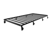 Metal bed frame with horizontal slats and supporting legs on Front Runner Toyota Land Cruiser 76 Roof Rack Kit