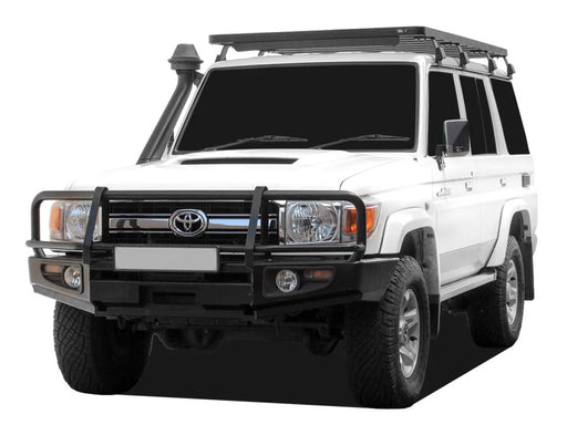 White Toyota Land Cruiser with roof rack kit and heavy-duty front bumper