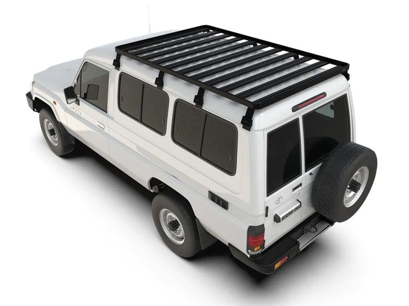 White Toyota Land Cruiser Troopy with Front Runner Roof Rack Kit for off-road adventures