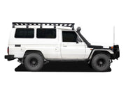 White off-road vehicle with Front Runner Toyota Land Cruiser 78 Slimline II roof rack kit