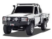 Rugged white off-road utility truck with flatbed and heavy-duty bumper roof rack kit