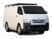 White Toyota cargo van with roof rack kit and roof rack for Toyota Quantum 2004+