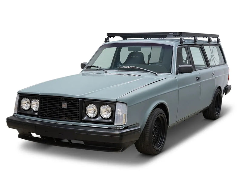 Light blue vintage Volvo 200 Series wagon with Slimline II roof rack kit for classic cars