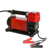 Premium air compressor with red and black components and attached jumper cables