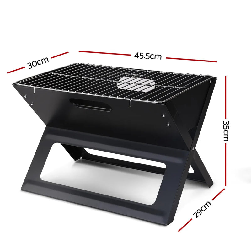 Portable folding charcoal BBQ grill with labeled dimensions for easy transport and use