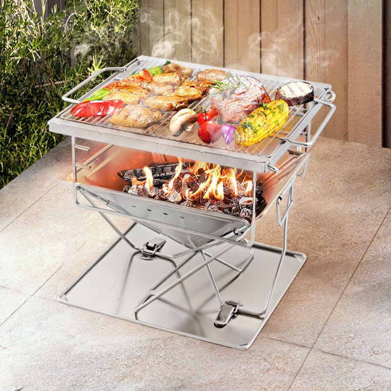 Portable stainless steel grillz portable fire pit with two-tier BBQ surface over fire