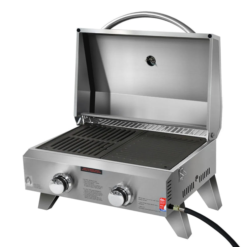 Portable stainless steel gas BBQ with two burners and open lid for outdoor grilling