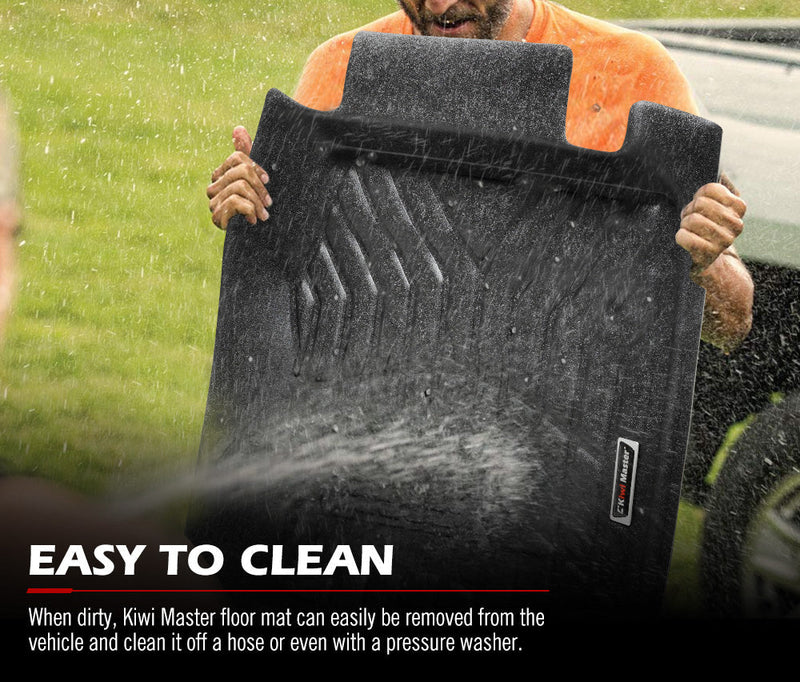 Black rubber car floor mats being cleaned with water spray for Kiwi Master 3D TPE Car Floor Mats for Isuzu MU-X 2013-2020