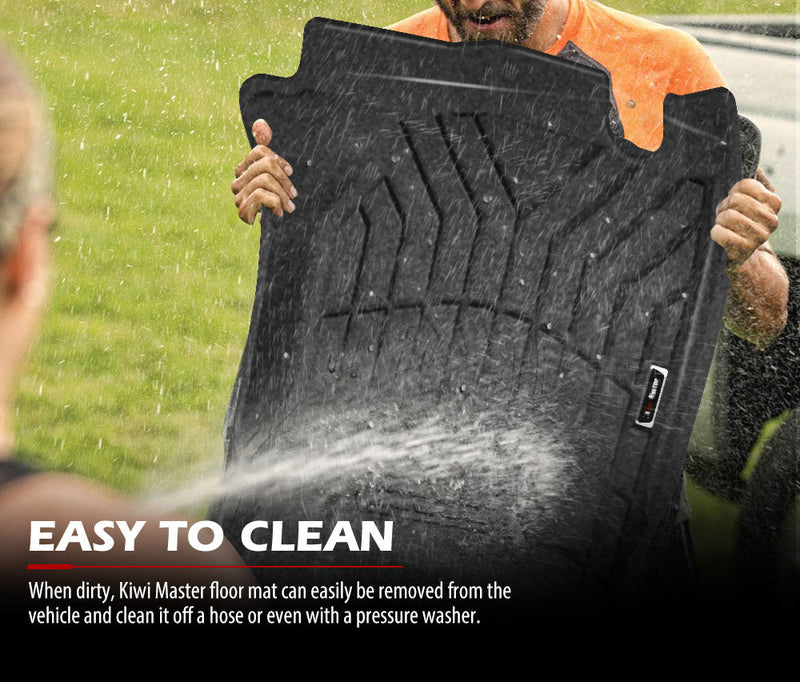 Black rubber floor mats being cleaned with pressure washer for Mitsubishi Triton Kiwi Master
