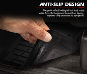 Car floor mats with anti-slip textured backing being lifted in a Holden Colorado car floor