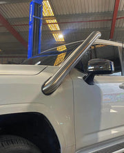White pickup truck with side step bar showcasing Meredith stainless steel snorkel kit for Toyota Landcruiser