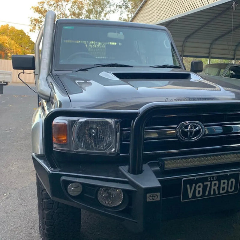 Toyota Land Cruiser with bull bar and custom plate featuring Meredith Stainless Steel Snorkel Kit