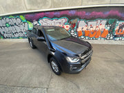 Gray pickup truck with stainless steel snorkel parked in front of graffiti wall for Isuzu DMAX