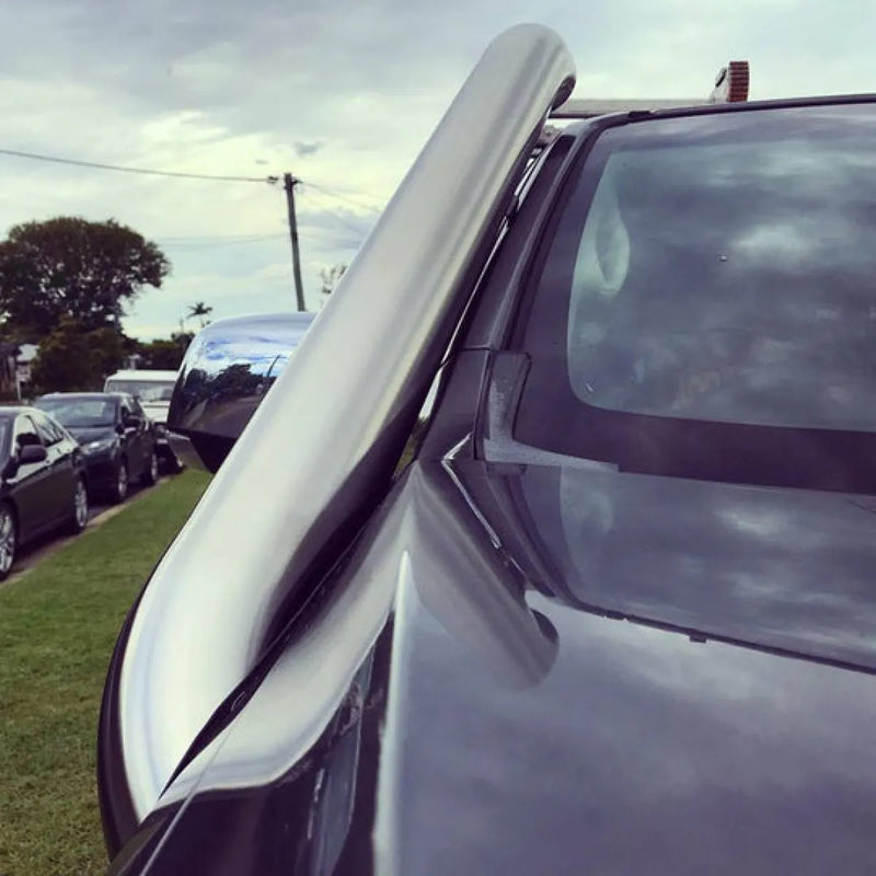 Sleek steel snorkel door with upward-opening wing design for Holden Trailblazer stainless steel snorkel kit
