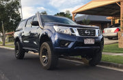Blue Nissan Navara pickup with off-road modifications and Meredith stainless steel snorkel kit