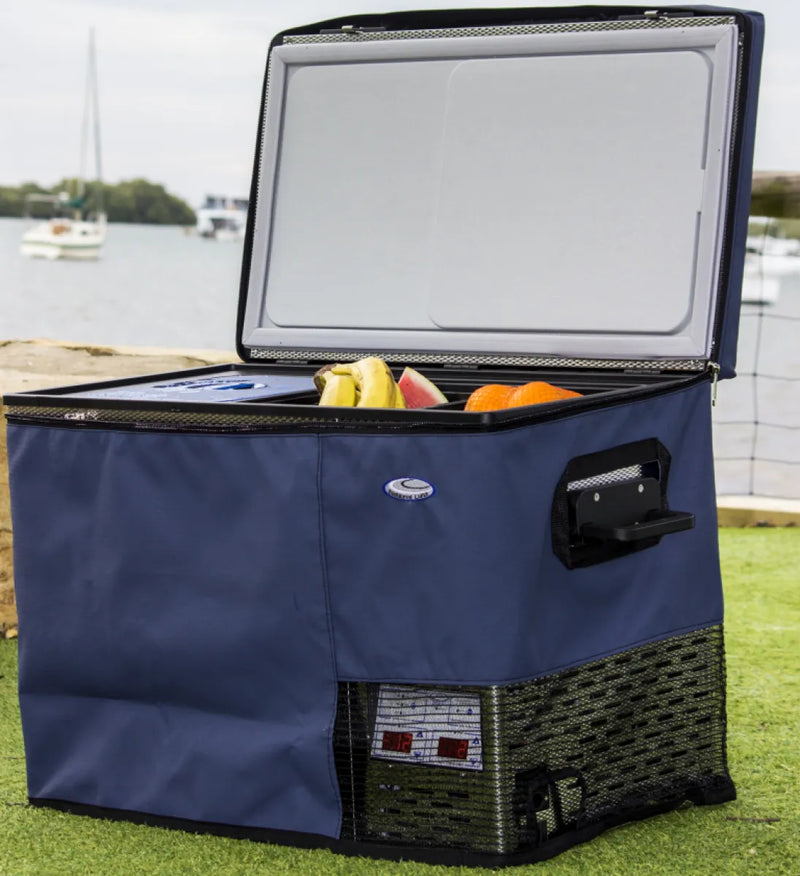 Portable electric cooler with navy blue exterior open lid packed with fresh fruits, National Luna fridge accessory