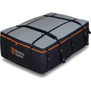 Roof-mounted cargo carrier with black gray fabric and orange accents for rooftop cargo