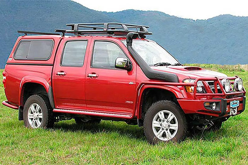 Red off-road pickup truck with roof rack, ideal for Holden Colorado safari snorkel SS166HF